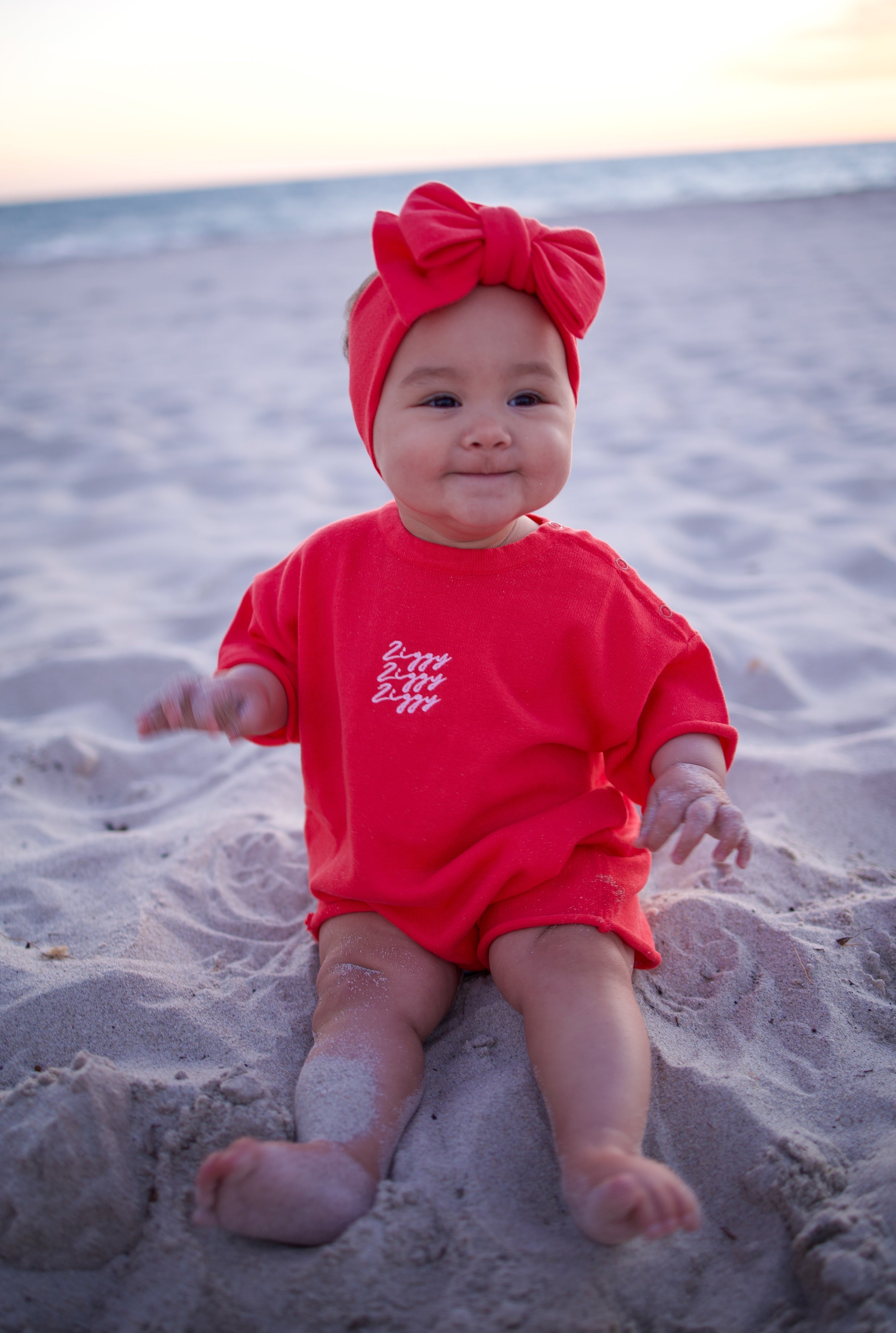 SIGNATURE PLAYSUIT POMEGRANATE