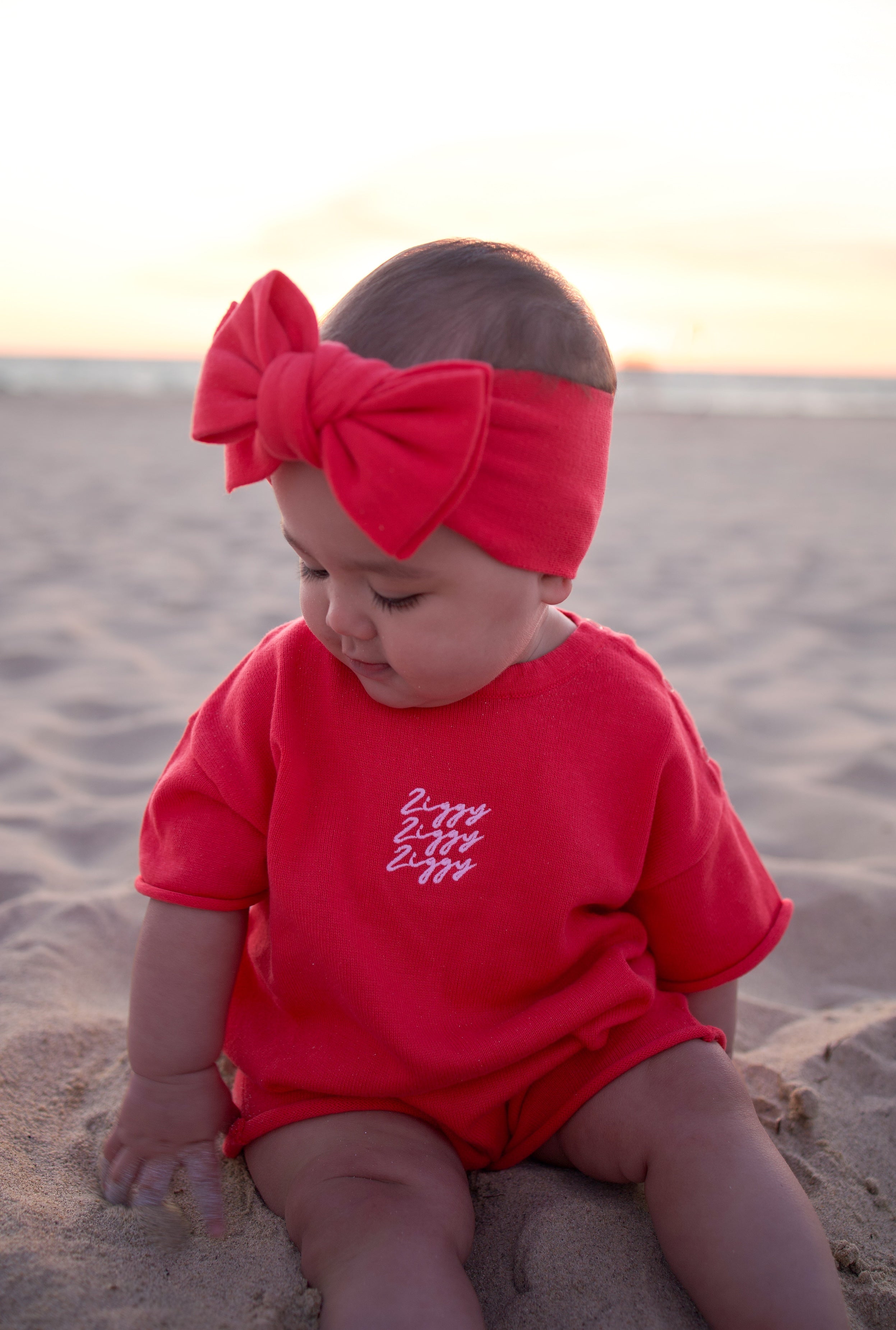 SIGNATURE PLAYSUIT POMEGRANATE