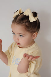 SIGNATURE TEE BUTTERCUP